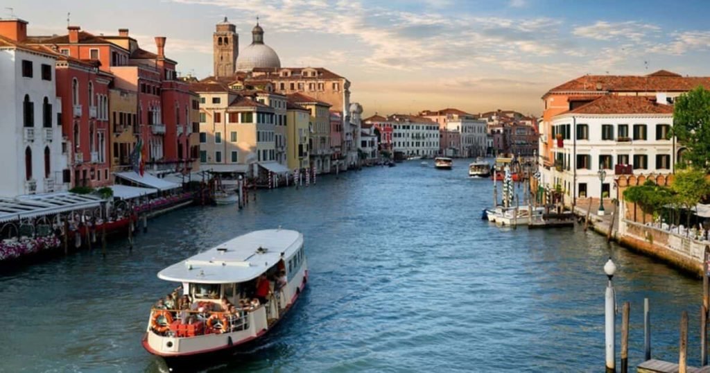 vaporetto in canal in venice
